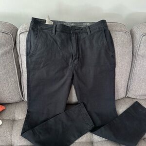 Levi’s chinos, washed back, slim taper.